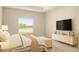 Serene bedroom with large window view, modern decor, and a comfortable, inviting atmosphere at 5079 Fairlane Dr, North Port, FL 34288