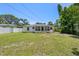 The backyard has ample space and greenery, perfect for gardening or outdoor enjoyment at 707 63Rd S Ave, St Petersburg, FL 33705