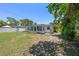 The backyard has ample space and greenery, perfect for gardening or outdoor enjoyment at 707 63Rd S Ave, St Petersburg, FL 33705