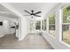 Bright breakfast nook featuring ample windows, wood-look floors, and views of the backyard at 707 63Rd S Ave, St Petersburg, FL 33705
