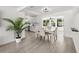 Open dining room featuring hardwood floors, natural lighting, and modern design at 707 63Rd S Ave, St Petersburg, FL 33705