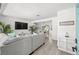 Bright living room with hardwood floors, modern decor, and an open-concept design at 707 63Rd S Ave, St Petersburg, FL 33705