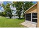 Backyard view of lake and fountain from patio at 7728 Balharbour Dr, New Port Richey, FL 34653