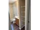 Bright bathroom with bath, shower, toilet, vanity and shelving at 837 Greenbelt Cir, Brandon, FL 33510