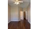 Spacious bedroom with wood floors, fan and access to closet and bathroom at 837 Greenbelt Cir, Brandon, FL 33510