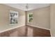 Bright bedroom with large windows providing natural light and pleasant neighborhood views at 837 Greenbelt Cir, Brandon, FL 33510