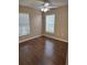 Relaxing bedroom with ceiling fan, and wood flooring at 837 Greenbelt Cir, Brandon, FL 33510