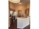 Functional kitchen boasts plentiful cabinets, and a breakfast bar, plus adjacent dining area at 837 Greenbelt Cir, Brandon, FL 33510