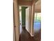 Charming living room leading to a sunny patio at 837 Greenbelt Cir, Brandon, FL 33510