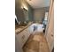 Beautiful bathroom with dual sinks, granite countertops, and a soaking tub at 4924 Creekside Trl, Sarasota, FL 34243