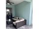 Comfortable seating arrangement in a screened lanai with tiled floors at 4924 Creekside Trl, Sarasota, FL 34243