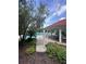Inviting poolside pavilion with ample seating and a refreshing community pool nearby at 4924 Creekside Trl, Sarasota, FL 34243