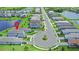 Beautiful aerial view of home in a neighborhood with lakes and lush green landscaping at 6256 Baywood Ct, Bradenton, FL 34211