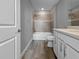 Bathroom featuring a soaking tub, tiled shower, and modern vanity at 6256 Baywood Ct, Bradenton, FL 34211