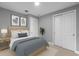 Bright bedroom featuring a natural wood bed frame and ample closet space at 6256 Baywood Ct, Bradenton, FL 34211