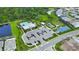 Aerial view of the community pool, playground, and recreational facilities at 6256 Baywood Ct, Bradenton, FL 34211