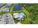 Stunning aerial view of the community pool and surrounding landscaping at 6256 Baywood Ct, Bradenton, FL 34211