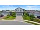 Charming two-story home with well-maintained landscaping and a two-car garage at 6256 Baywood Ct, Bradenton, FL 34211