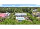 Aerial view showcasing the house, pool and storage shed at 7341 Hart St, Englewood, FL 34224