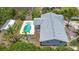 Aerial view showcasing the house, pool and storage shed at 7341 Hart St, Englewood, FL 34224