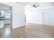 Open living room with light wood floors and an airy feel at 7341 Hart St, Englewood, FL 34224