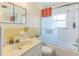 Bright bathroom featuring a shower-tub combo and a vanity sink at 8490 7Th Ln N,, St Petersburg, FL 33702
