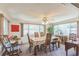 Traditional dining room with ample natural light and comfortable seating at 8490 7Th Ln N,, St Petersburg, FL 33702