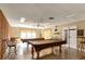 Billiard room offering two tables, chairs, ceiling fan and good light at 1244 E Corktree Cir, Port Charlotte, FL 33952