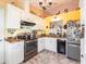 A cozy kitchen featuring granite countertops and stainless steel appliances at 1244 E Corktree Cir, Port Charlotte, FL 33952