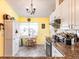 Bright kitchen featuring granite countertops, an eat-in nook and ample cabinet space at 1244 E Corktree Cir, Port Charlotte, FL 33952