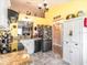 Modern kitchen featuring updated stainless-steel appliances, abundant cabinet space, and granite countertops at 1244 E Corktree Cir, Port Charlotte, FL 33952