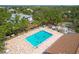 Relaxing outdoor swimming pool with many chairs, tables, and ample deck space at 1244 E Corktree Cir, Port Charlotte, FL 33952