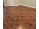Finished basement with wood-look tile flooring for a warm, stylish space at 4307 Bayside Village Dr # 103, Tampa, FL 33615
