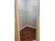 Bedroom closet features wire shelving and wood-look tile flooring at 4307 Bayside Village Dr # 103, Tampa, FL 33615