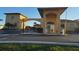 An inviting entrance to the community features an arched entryway and secure access at 4307 Bayside Village Dr # 103, Tampa, FL 33615