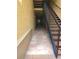 Hallway with tile flooring, leading to stairwell access at 4307 Bayside Village Dr # 103, Tampa, FL 33615