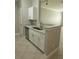 Bright kitchen features granite counters, stainless steel appliances, and white cabinetry at 4307 Bayside Village Dr # 103, Tampa, FL 33615