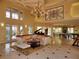 Spacious lobby featuring a seating area, piano, billiard tables, and stylish decor at 4307 Bayside Village Dr # 103, Tampa, FL 33615