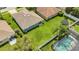Aerial view of the home with a large manicured backyard, pool and partial fencing at 5145 Prairie View Way, Wesley Chapel, FL 33545