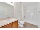 Well-lit bathroom featuring a vanity with a sink, toilet, and shower-tub combo at 5145 Prairie View Way, Wesley Chapel, FL 33545