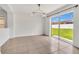 The dining area has a sliding glass door that leads to the backyard at 5145 Prairie View Way, Wesley Chapel, FL 33545