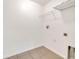 Empty laundry room with tile flooring and shelving at 5145 Prairie View Way, Wesley Chapel, FL 33545