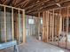 Interior of home under renovation with exposed framing, concrete walls, and flooring at 801 Marlin Dr, Punta Gorda, FL 33950