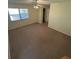 Bedroom featuring carpet, a ceiling fan, and neutral color palette at 9504 W Cluster Ave, Tampa, FL 33615