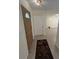 Light and airy foyer with tile flooring that transitions into an open floor plan at 9504 W Cluster Ave, Tampa, FL 33615