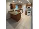 Well-appointed kitchen with updated countertops, modern appliances, and ample cabinet space at 9504 W Cluster Ave, Tampa, FL 33615