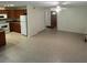 Open concept living space with tile flooring, modern appliances, and plenty of natural light at 9504 W Cluster Ave, Tampa, FL 33615