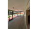 Spacious covered patio with brick accents for enjoying the outdoors at 9504 W Cluster Ave, Tampa, FL 33615