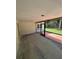 Covered patio with brick trim, great for relaxing outdoors at 9504 W Cluster Ave, Tampa, FL 33615