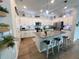 Well-equipped kitchen featuring a center island, stainless steel appliances, and ample storage at 3567 74Th Avenue E Cir, Sarasota, FL 34243